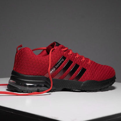 Men's Stevvex red breathable mesh running sneakers with air cushion and black sole on Tampa Home & Garden Store