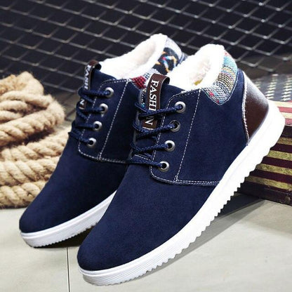 Men's navy winter boots with plush white lining, lace-up front, white sole on Tampa Home & Garden Store