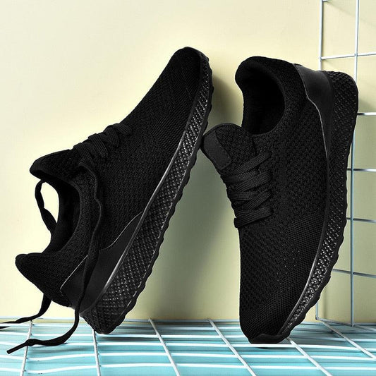 Men's Stevvex sneakers, black breathable mesh, lace-up athletic running shoes, pair on Tampa Home & Garden Store