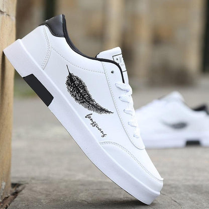Stevvex white breathable sneakers with black feather graphic and non-slip sole on Tampa Home & Garden Store