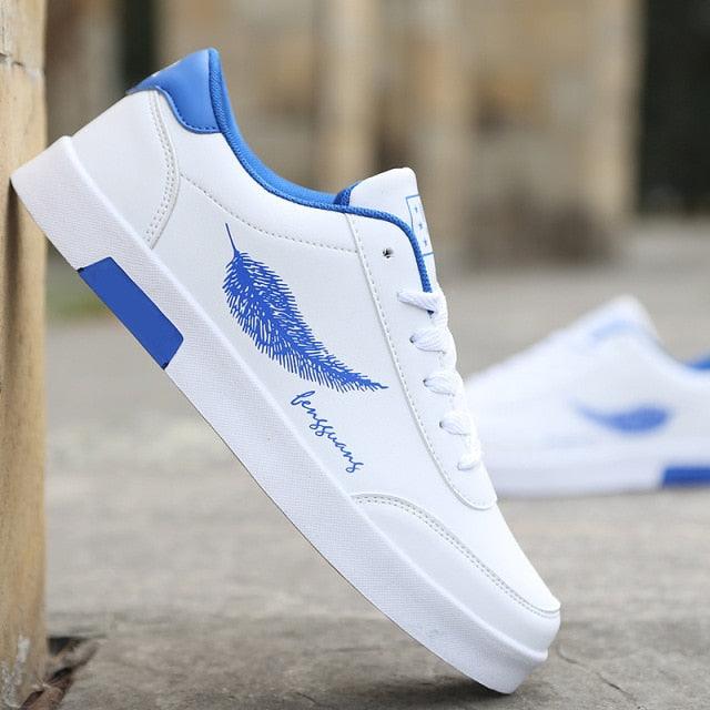 Stevvex white breathable sneakers with blue accent and non-slip sole, running shoes pair on Tampa Home & Garden Store