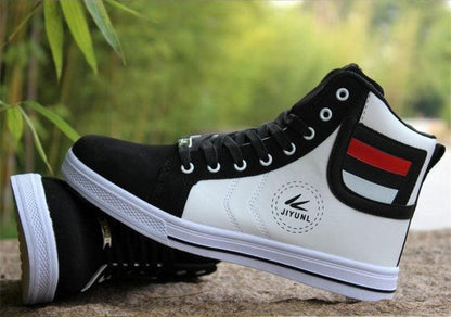Men's Breathable High Top Casual Sneakers by Stevvex in black and white with red heel stripe on Tampa Home & Garden Store
