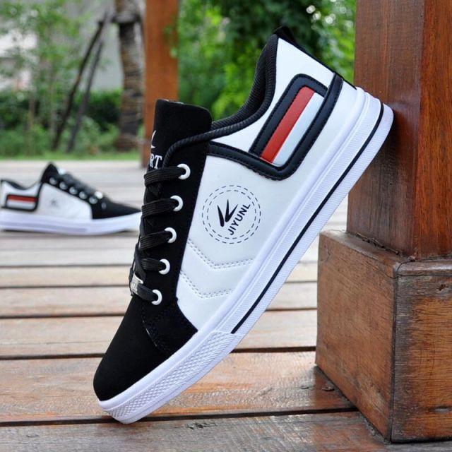 Stevvex men's breathable high-top sneakers in black and white with red accents, lace-up pair on Tampa Home & Garden Store
