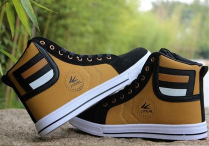 Men's breathable high-top sneakers pair in tan and black with white sole and JIYUN logo on side on Tampa Home & Garden Store