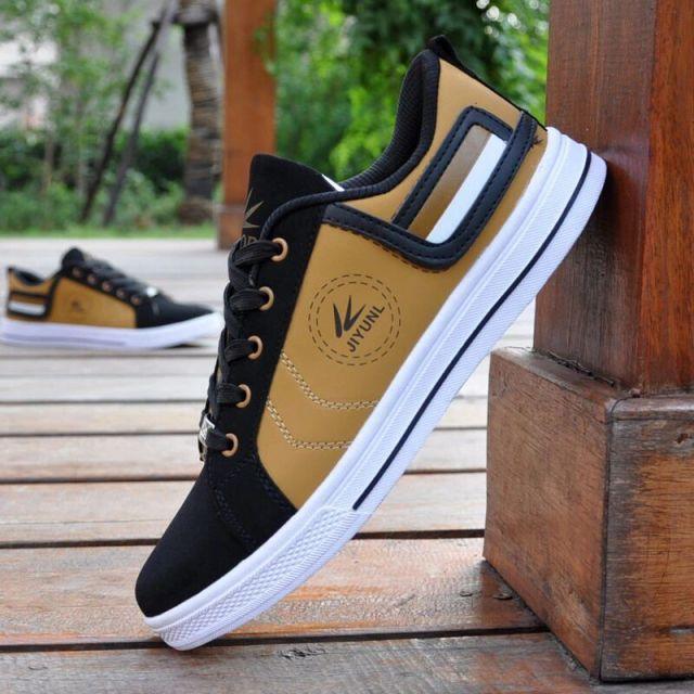 Pair of men's Stevvex breathable high-top sneakers in black and tan with white sole on Tampa Home & Garden Store