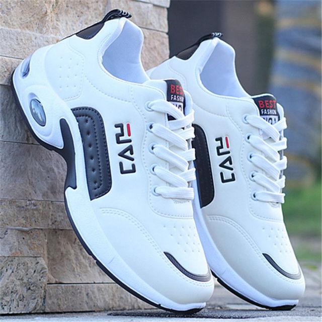 Men's Stevvex white leather sneakers pair with black side panels, casual fashion running shoes on Tampa Home & Garden Store