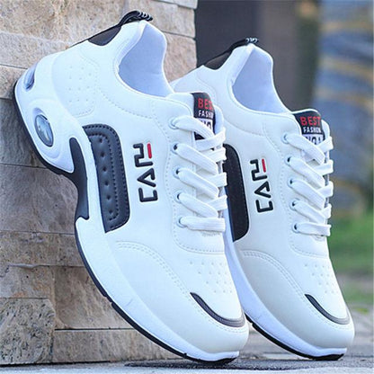Men's Stevvex white leather sneakers pair with black side panels, casual fashion running shoes on Tampa Home & Garden Store