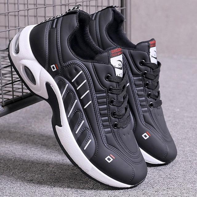 Men's black leather sneakers Stevvex pair with white sole and lace-up front on Tampa Home & Garden Store