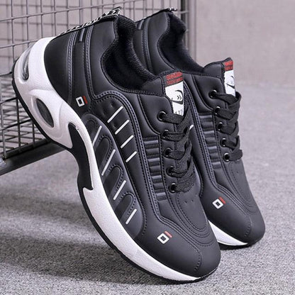 Men's black leather sneakers Stevvex pair with white sole and lace-up front on Tampa Home & Garden Store