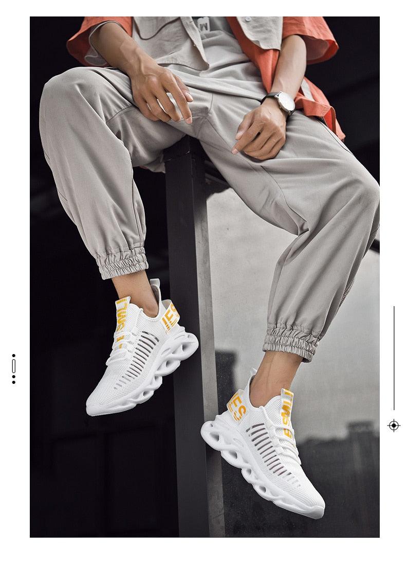Stevvex men's luxury sneakers white breathable rubber shoes with yellow heel branding on Tampa Home & Garden Store