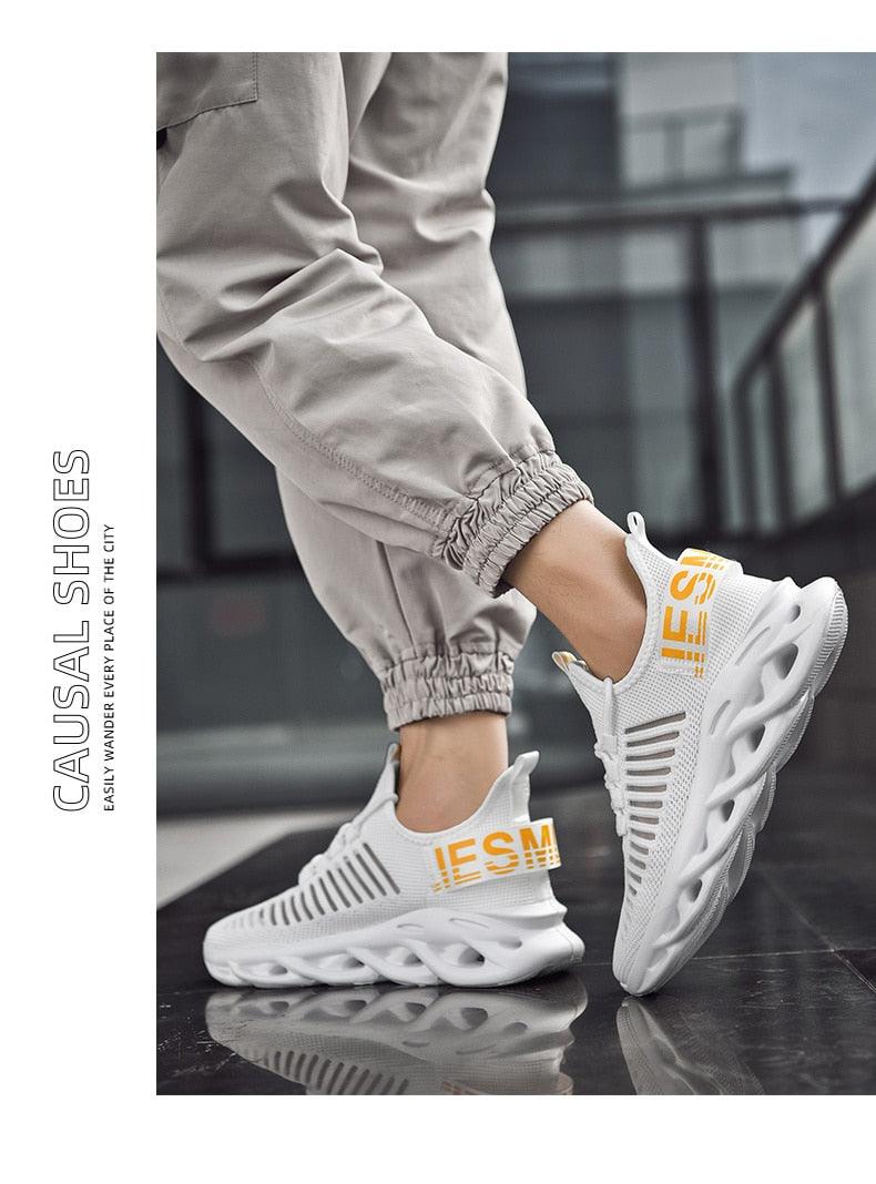 Men's luxury sneakers by Stevvex with breathable knit upper and orange branding heel pair on Tampa Home & Garden Store