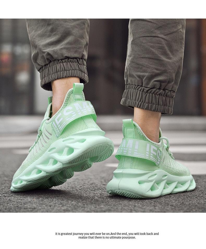 Men's luxury sneakers in mint green with breathable mesh upper and sculpted rubber sole on Tampa Home & Garden Store