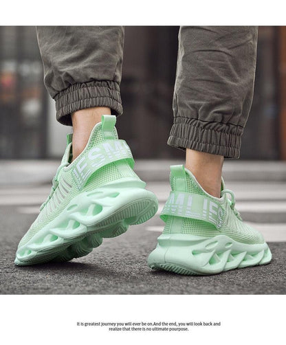 Men's luxury sneakers in mint green with breathable mesh upper and sculpted rubber sole on Tampa Home & Garden Store