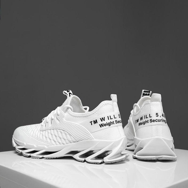 Pair of white men's running sneakers with breathable mesh upper and segmented outsole on Tampa Home & Garden Store