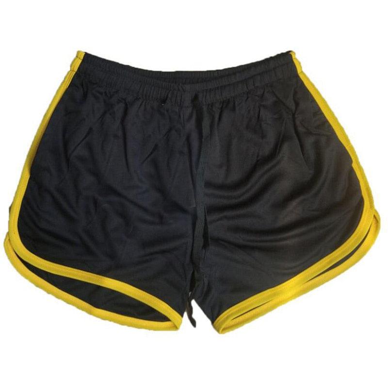 Stevvex men's black athletic shorts with yellow piping and elastic waistband on Tampa Home & Garden Store