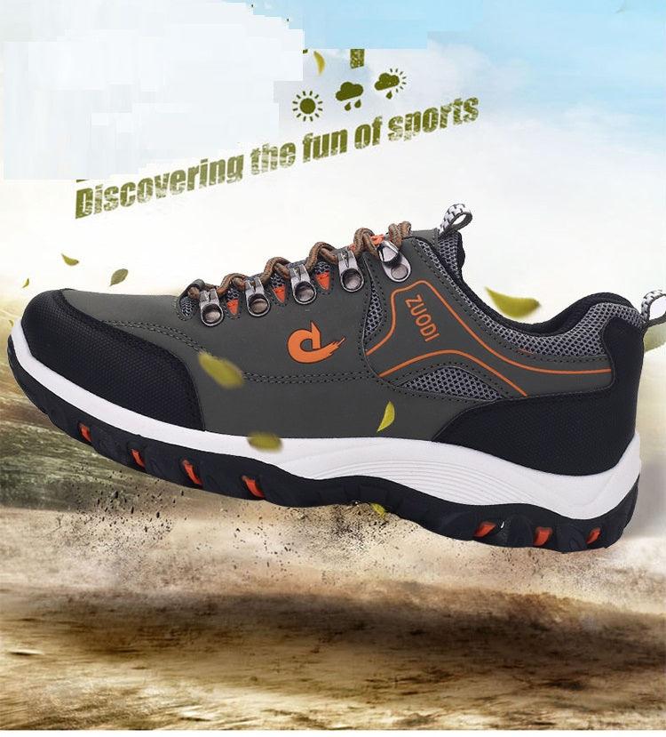 Men's hiking shoes low-top athletic footwear grey/black with orange accents and rugged outsole on Tampa Home & Garden Store