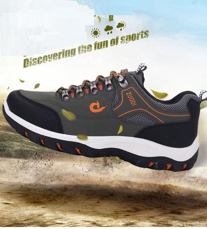 Men's hiking shoes low-top athletic footwear grey/black with orange accents and rugged outsole on Tampa Home & Garden Store