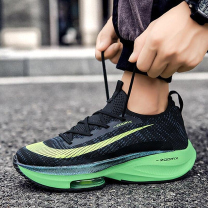 Men's Stevvex athletic shoes black knit upper with neon lime stripe and green air-cushion sole on Tampa Home & Garden Store