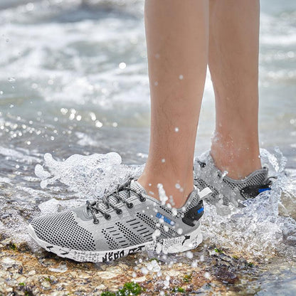 Men's water sports sneakers Stevvex grey quick-dry outdoor footwear on rocky coast waves on Tampa Home & Garden Store