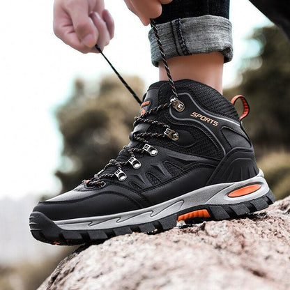 Stevvex hiking boots black high-top with rugged outsole and orange accents on Tampa Home & Garden Store