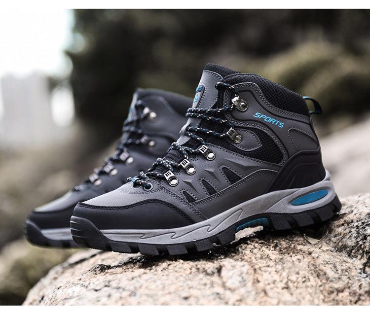 Stevvex high-top hiking boots in gray/black with blue accents and rugged outsole on Tampa Home & Garden Store