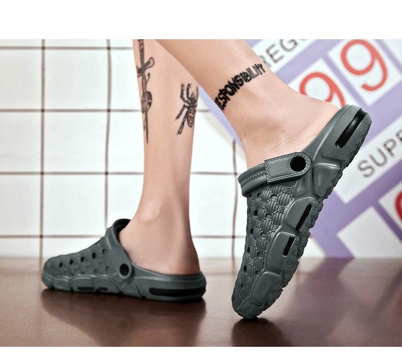 Pair of Stevvex gray rubber sandals with ventilation holes and non-slip soles on Tampa Home & Garden Store