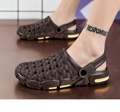 Men's black slip-on garden sandals with perforated upper and back strap, yellow accents on sole on Tampa Home & Garden Store
