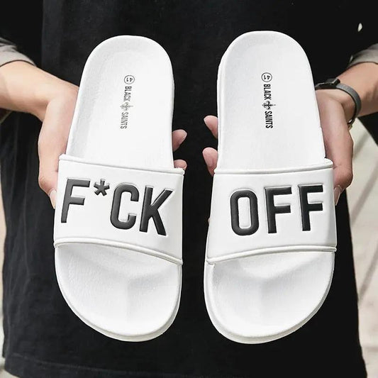 Stevvex white pair of slide sandals for men with bold black F*CK OFF lettering on straps on Tampa Home & Garden Store