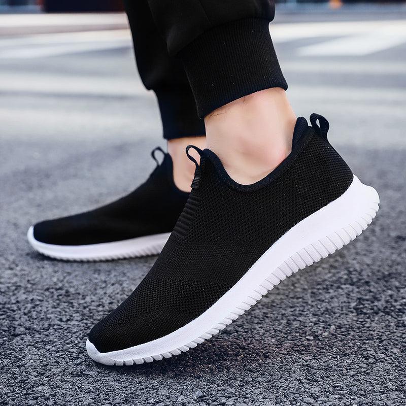 Stevvex men's slip-on mesh sneakers, black knit upper with white sole on Tampa Home & Garden Store