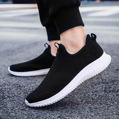 Stevvex men's slip-on mesh sneakers, black knit upper with white sole on Tampa Home & Garden Store