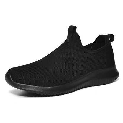 Stevvex men's black mesh slip-on sneakers with breathable knit upper and lightweight sole on Tampa Home & Garden Store