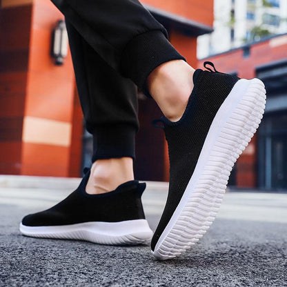 Men's Stevvex slip-on mesh sneakers in black with white sole and breathable upper on Tampa Home & Garden Store