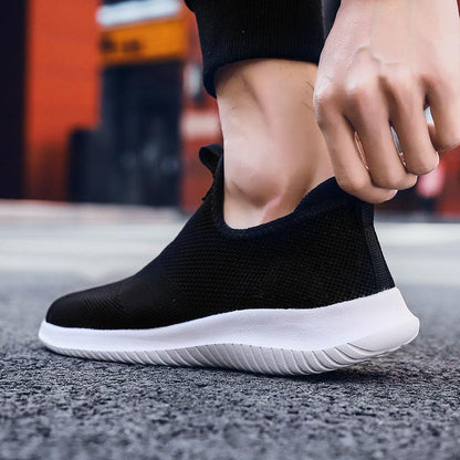 Stevvex men's black mesh slip-on sneakers with white outsole, lightweight breathable sneakers on Tampa Home & Garden Store