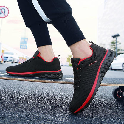 Stevvex Men sport lightweight running sneakers pair black knit upper red trim non-slip sole on Tampa Home & Garden Store