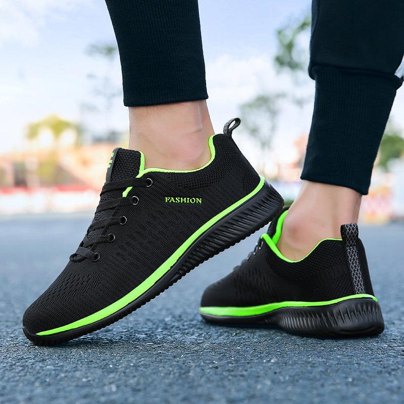 Men's black running sneakers with neon green trim, breathable mesh upper, non-slip sole pair on Tampa Home & Garden Store