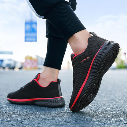 Men's running sneakers by Stevvex, black with red trim, non-slip, lightweight breathable on Tampa Home & Garden Store