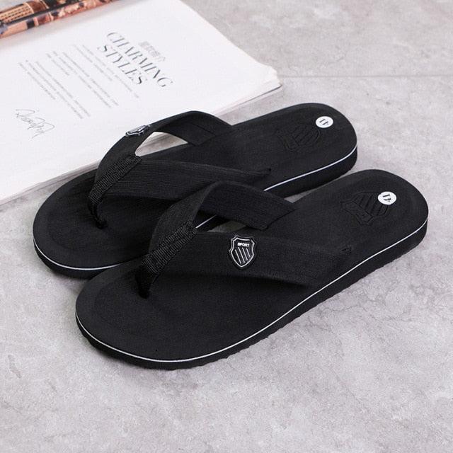 Stevvex black flip flop sandals with thong straps and white-edged sole on Tampa Home & Garden Store