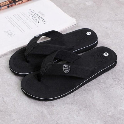 Stevvex black flip flop sandals with thong straps and white-edged sole on Tampa Home & Garden Store
