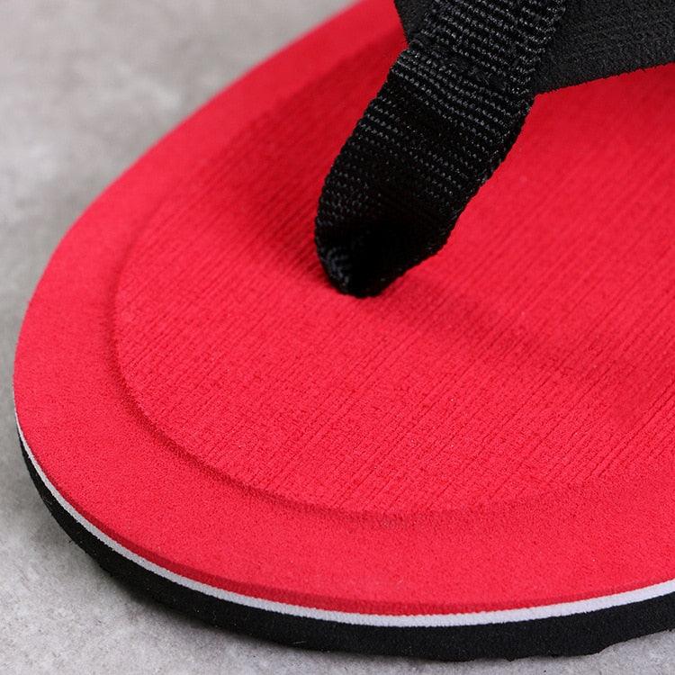Stevvex red flip flop sandal with black thong strap and white-edged sole for beachwear on Tampa Home & Garden Store