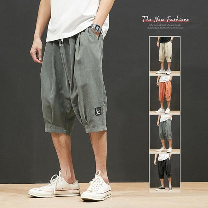 Stevvex men's gray-green jogger shorts with drawstring waist and knee-length loose fit pockets on Tampa Home & Garden Store