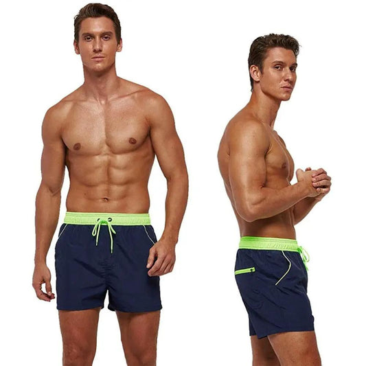 Men's Stevvex navy swim shorts with neon green waist and drawstring two views on Tampa Home & Garden Store