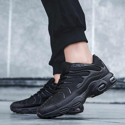 Mens Stevvex athletic shoes with black mesh upper and visible air cushion sole on Tampa Home & Garden Store