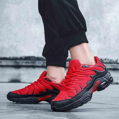 Mens Stevvex athletic running shoes, red mesh upper with black outsole, air-cushion pair on Tampa Home & Garden Store