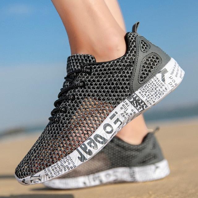 Men's Stevvex breathable black mesh water shoes pair with quick-dry tech and white sole on Tampa Home & Garden Store
