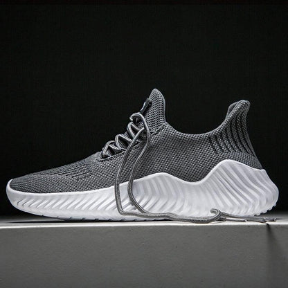 Stevvex men's breathable mesh sneakers with grey knit upper and white wavy sole on Tampa Home & Garden Store
