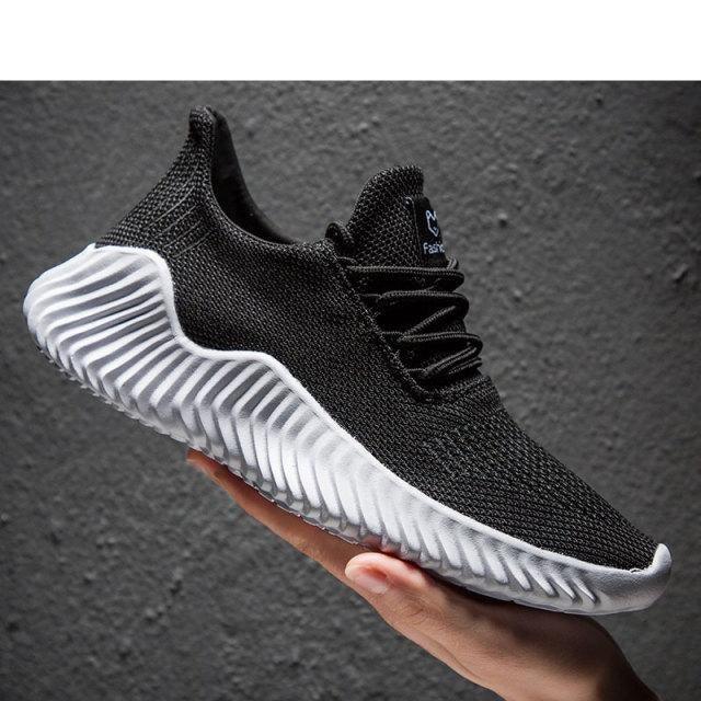 Stevvex men's breathable black mesh sneakers with white ribbed outsole on Tampa Home & Garden Store