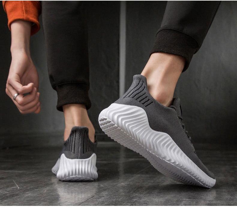 Mens sneakers Stevvex grey knit mesh with white cushioned sole pair on Tampa Home & Garden Store