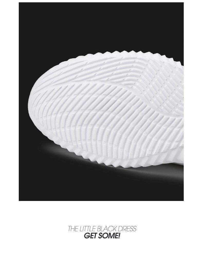 Mens white Stevvex breathable sneaker sole close-up with ribbed traction pattern on Tampa Home & Garden Store