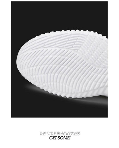 Mens white Stevvex breathable sneaker sole close-up with ribbed traction pattern on Tampa Home & Garden Store