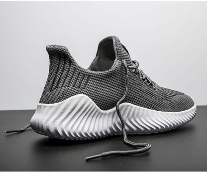 Mens breathable gray mesh sneakers with a white sculpted sole for walking and running on Tampa Home & Garden Store